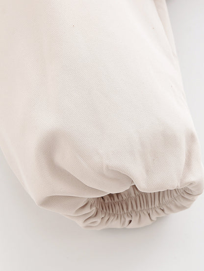 Jaqueta A Sentinela de Hawkins: Bomber Exclusiva TRAF - Atitude e Conforto Vintage.